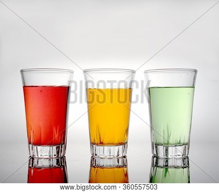 Water In Three Glass Color Of Drink.