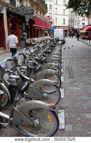 Paris , Seine / France - 11 18 2019 : Shared Rental Bicycle Row Of Rent Bikes Velib Service In Paris