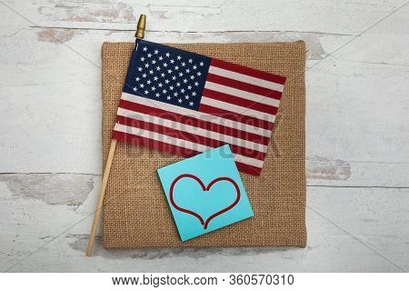 One Heart On Posted Note With An American Flag Flat Lay Design Background