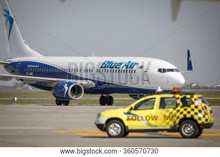 Otopeni, Romania - April 9, 2020: Blue Air Airplane On Henri Coanda International Airport.
