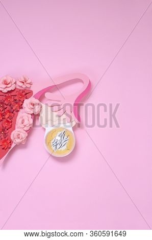 Creative Concept Of Gynecological Disease. Metaphor, Illustration Of The Dermoid Cyst Of The Ovary. 