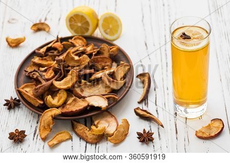 Dried Fruits Drink With Lemon On A Wooden Background. Uzvar Could Be Drunk Cold Or Hot.