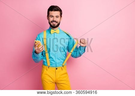 Portrait Of His He Nice Attractive Cheerful Cheery Confident Bearded Guy Holding In Hands Cell Pulin