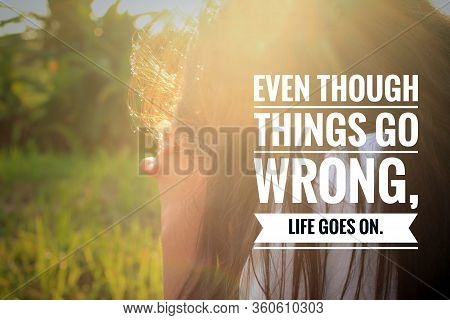 Inspirational Quote - Even Though Things Go Wrong, Life Goes On. With Young Girl Sitting Alone In Fi