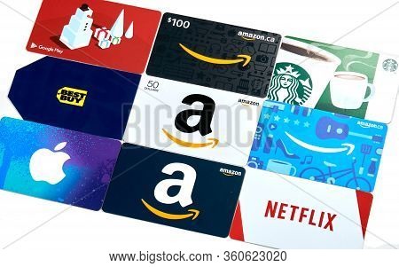 Montreal, Canada - April 9, 2020: Different Gift Cards Of Many Brands Such As Amazon, Netflix, Xbox,