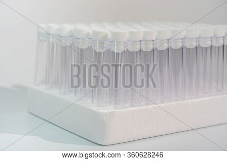 Group Of Empty Vacuum Venipuncture Test Tubes In Laboratory