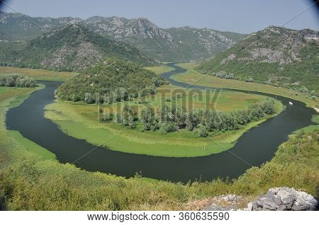 Rijeka Crnojevića, Part Of The Skadar Lake In Montenegro. Tourist Cruises By Boat On The Beautiful M