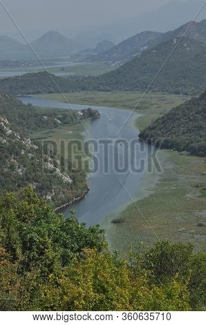 Rijeka Crnojevića, Part Of The Skadar Lake In Montenegro. Tourist Cruises By Boat On The Beautiful M
