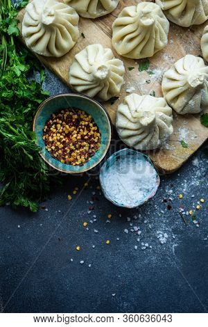 Traditional Georgian Khinkali Dish On Stone Background