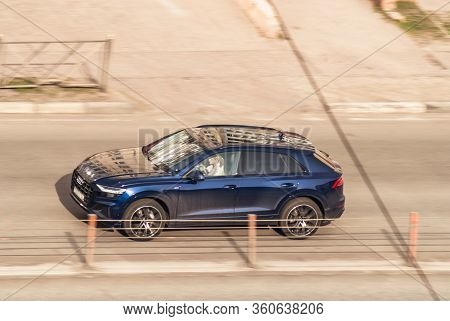 Moscow , Russia - April 09, 2020: Audi Q8 Suv Vehicle On The City Road. Fast Moving Gray Car On Mosc