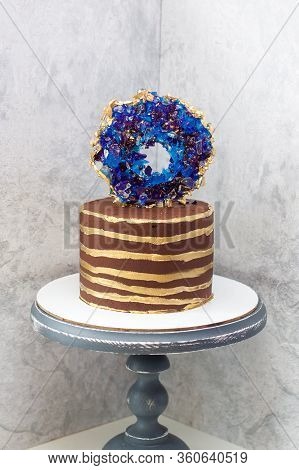Chocolate Modern Cake With Golden Stripes And Blue Isomalt Geode