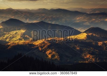Mountain Peaks At Sunset. Panorama Of Mountain Chain From A Top View