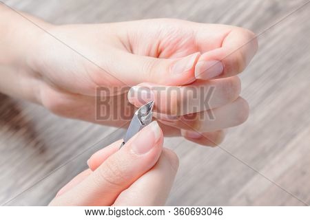 A Woman Does A Manicure At Home. Manicure Tools. Edged Manicure. Dangerous Manicure. Home Care, Spa,