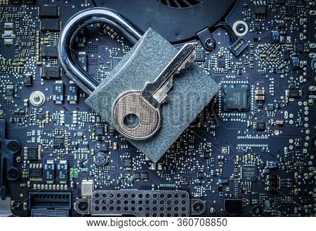 Data Protecting Security Concept. Computer Internet Protection With Lock, Key On Microscheme Chip. S