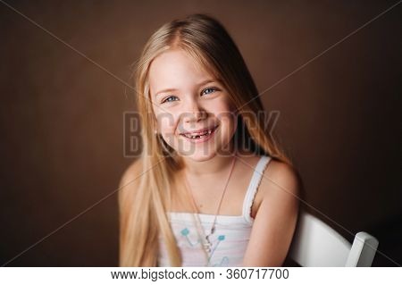 Summer Portrait Of A Happy Cute Baby With A Smile