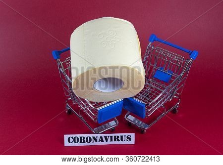 Consumer Buying Panic About Coronavirus Covid-19 Concept. Toilet Paper Roll In Shopping Trolley With