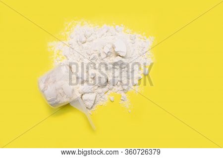 Pile Of Banana Protein Powder Isolated On Yellow Background