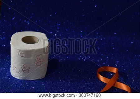 Roll Of Toilet Paper On Glitter Blue Background