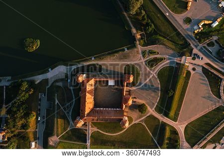 Mir Castle With Spires Near The Lake Top View In Belarus Near The City Of Mir