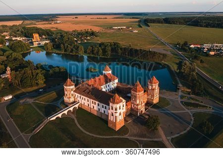 Mir Castle With Spires Near The Lake Top View In Belarus Near The City Of Mir