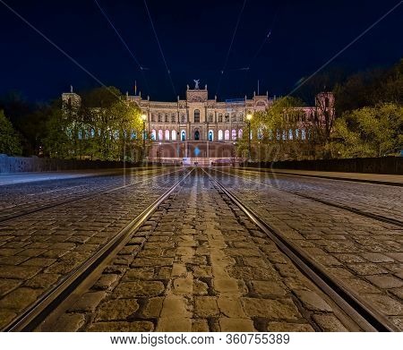 Symmetry Of Tram Tracks In Front Of The Bayrischer Landtag In Munich City At Night.