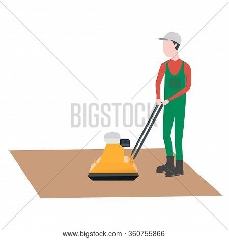 Sand Compactor. Man Works. Sand-laying Machine For Artificial Grass.