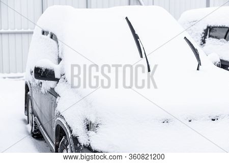 Car Standing In Snow. Snowdrift Of Snow By Car. Snow Covered Car. Winter, Snow, Car In Snowdrift.