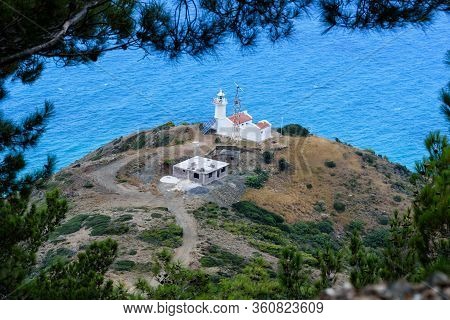 Top View To Lighthouse, Turkey. Deep Blue Sea, Lighthouse, Trees.