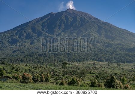 Smoke From Almost Perfectly Shaped Kerinci Mountain Is The Highest Volcano In South East Asia