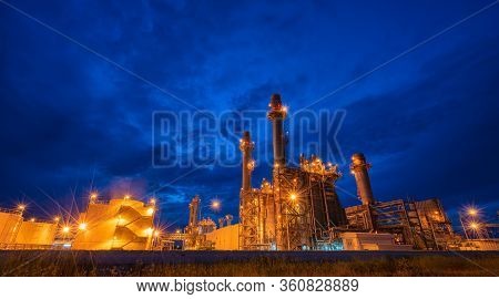 Power Plant On Blue Sky. Chimney Of Thermal Power Plants. Gas Turbine Electrical Power Plant At Indu