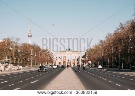 Berlin, Germany - 04.04.2020: View On The Street, The Brandenburg Gate And Tv-tower In The Center Of