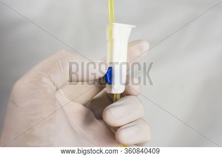 Anesthesiologist Doctors Is Adjusting Extension Tube Control Of Saline Solution Mixed Drug,corona Vi