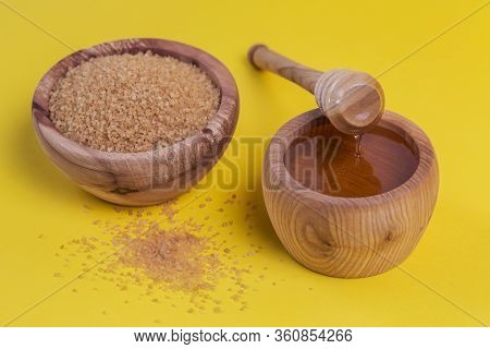 Ingredients For Make Homemade Sugaring Paste. Brown Sugar And Honey On Yellow Background. Beauty Con