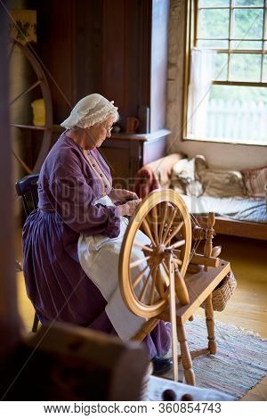 Upper Canada Village, Morrisburg, Ontario, Canada - October 17, 2019: Actors Play The Role Of Reside