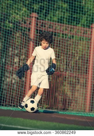 Summer Soccer Tournament For Young Kids. Football Club. Emotions And Joy Of The Game. Young Goalie. 