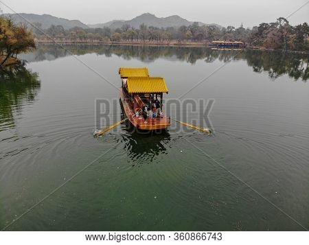 Aerial View Of Old Chinese Boat On The Lake Inside The Imperial Summer Palace Of The Mountain Resort