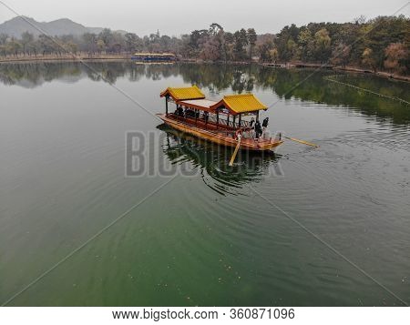 Aerial View Of Old Chinese Boat On The Lake Inside The Imperial Summer Palace Of The Mountain Resort