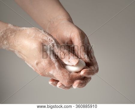 Wash Your Hands With Soap To Protect Them From Viruses And Bacteria. The Concept Of Protecting And P