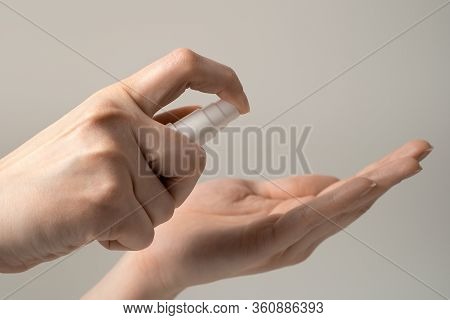 Hand Disinfection With Gel And Alcohol. The Spray Is Used To Clean Hands And Destroy Germs, Bacteria