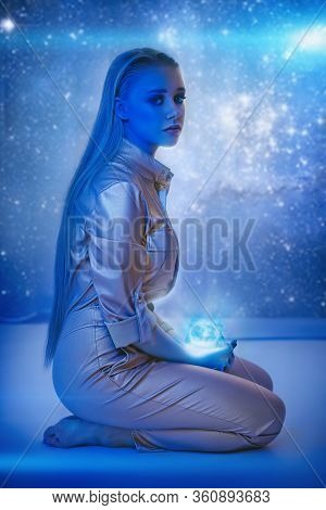 Stock Photo - Mysterious Girl In The Blue Light. Art Photo