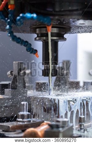 A Process Of Cnc Vertical Drilling With Liquid Coolant Flow
