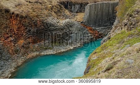 Studlagil Basalt Canyon, Iceland. This Is A Rare Volcanic Basalt Column Formation