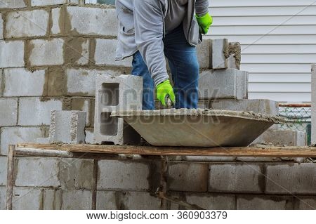 Bricklayers New House Wall On Foundation Hands With In Masonry Bricklaying