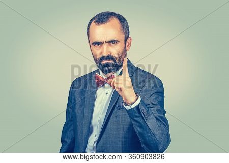 Closeup Portrait Headshot Confident Angry Serious Young Man, Business Man Showing Index Finger For A
