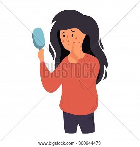 A Woman Examines Her Face In A Mirror. Acne, Skin Problems And Acne.