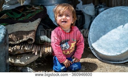 Shiraz, Iran - May 2019: Qashqai Turkish Nomadic Child Crying Inside A Tent. The Qasqhai Are Nomadic