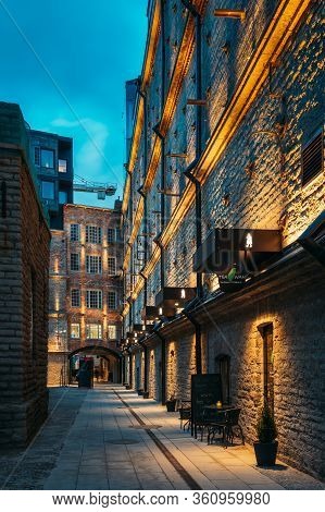 Tallinn, Estonia - December 5, 2016: Cafe In Historical Rotermann City Quarter In Evening Illuminati