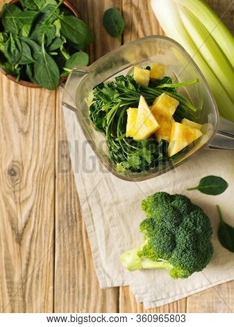 Ingrediets For Green Smoothie - Parsley, Spinach, Broccoli And Celery On Wooden Table, Top View, Cop
