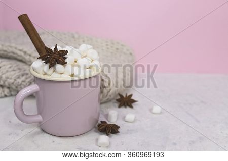 Marshmallows In Enameled Mug With  Star Anise And Cinnamon Stick