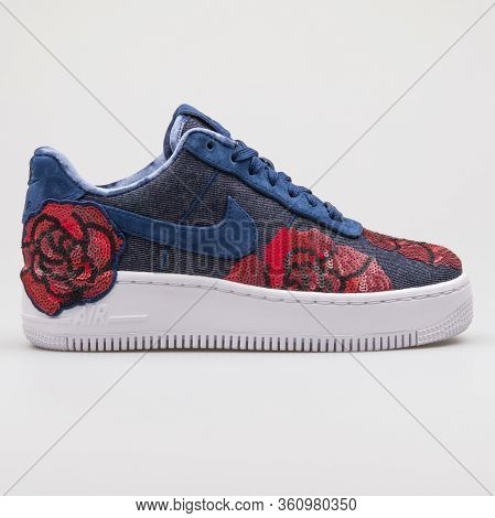 Vienna, Austria - August 22, 2017: Nike Air Force 1 Upstep Lx Blue, Black And Red Rose Sneaker On Wh